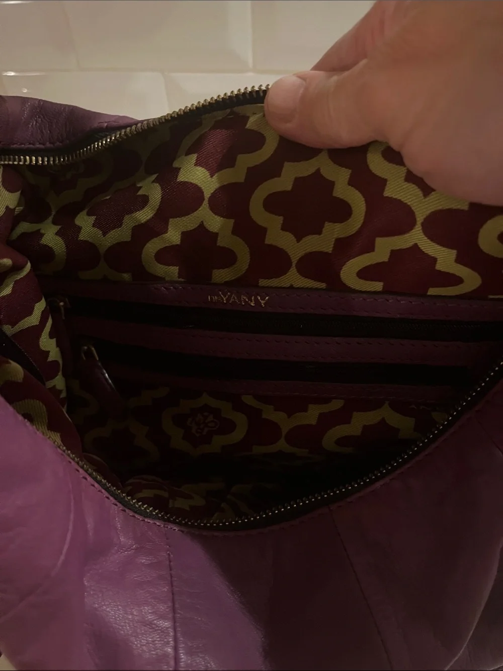 orYANY purple Studded  fringed Leather Hobo Bag with geometric interior material